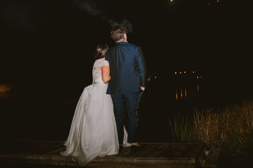The two of them on the dock at night